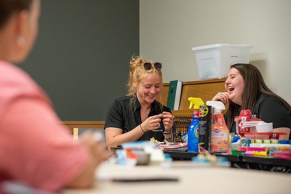 Freshman and other students on campus at I-Night. They participate in many activities.