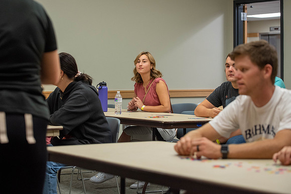 Freshman and other students on campus at I-Night. They participate in many activities.