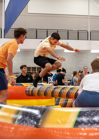 Freshman and other students on campus at I-Night. They participate in many activities.