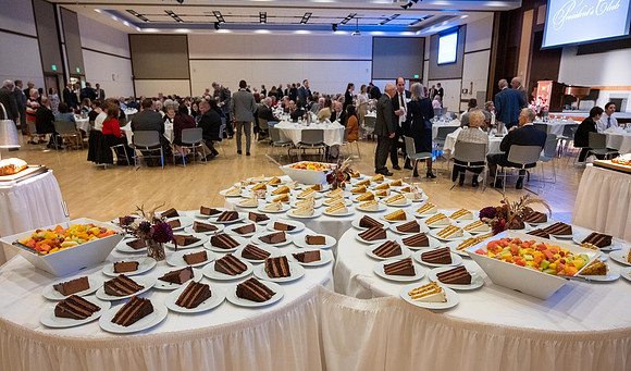 President's Club members enjoy an evening of socializing, musical entertainment and wonderful food in the Manwaring Center Ballroom.