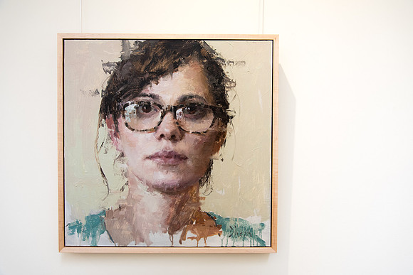 A portrait by artist, Jacob Dhien, hung in the Spori Building.