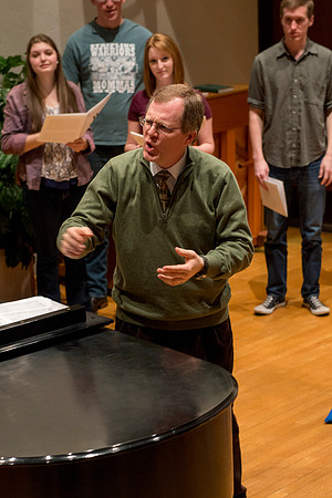 Brother Randall Kempton teaches and conducts his Collegiate Singers Choir.