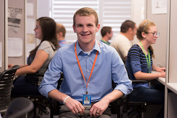 Employees work on developing a better curriculum for online students.
