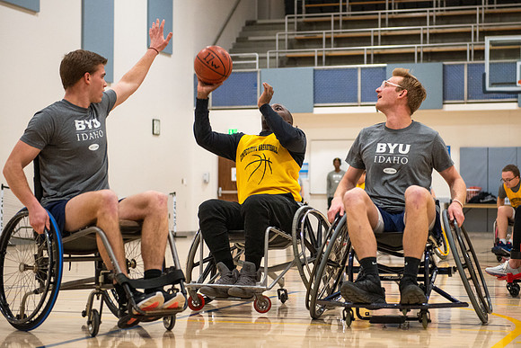 Students participate of Wheelchair Basketball in the Hart Gym.