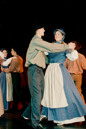 Folk dancers perform.