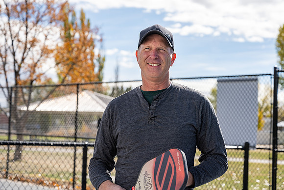 Dinking around playing pickleball for the HR Wellness Video.