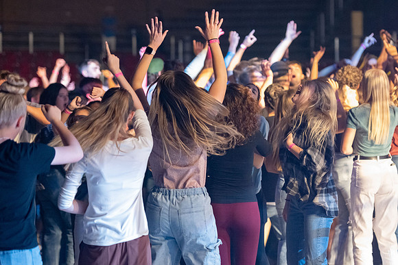 Students gather on campus to celebrate First Friday events.