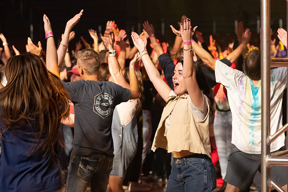 Students gather on campus to celebrate First Friday events.