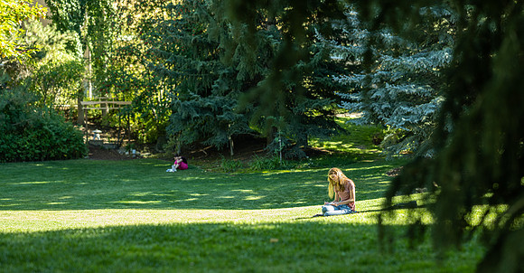 Students enjoy the tranquility of the Ricks Horticulture Gardens.