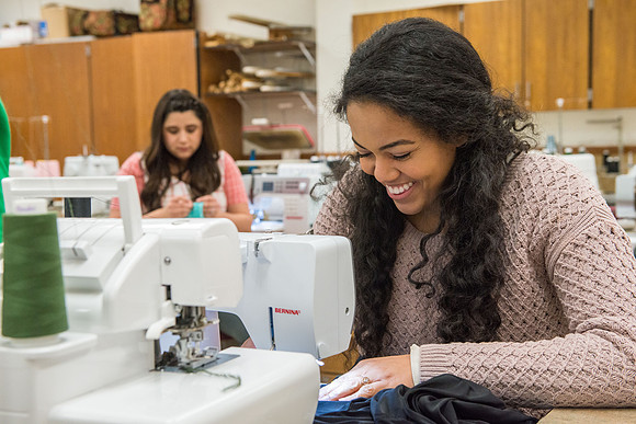 Students in Genet Ormes Apparel Entrepreneurship class work on their final project.
