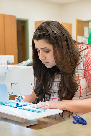 Students in Genet Ormes Apparel Entrepreneurship class work on their final project.