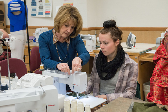 Students in Genet Ormes Apparel Entrepreneurship class work on their final project.