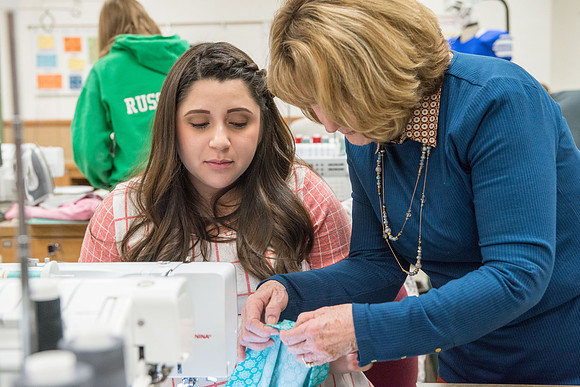 Students in Genet Ormes Apparel Entrepreneurship class work on their final project.