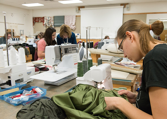 Students in Genet Ormes Apparel Entrepreneurship class work on their final project.