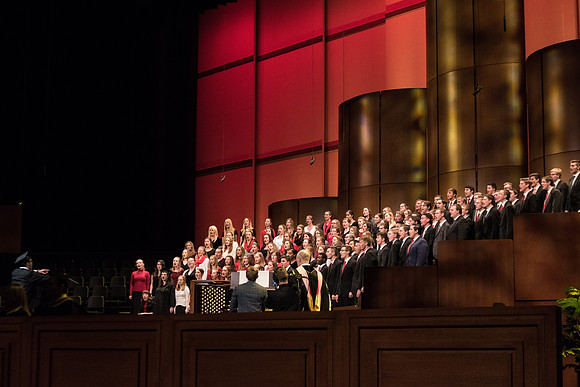 The Combined Women's and Men's Choir sings, "Hark! The Herald Angels Sing," during Commencement.