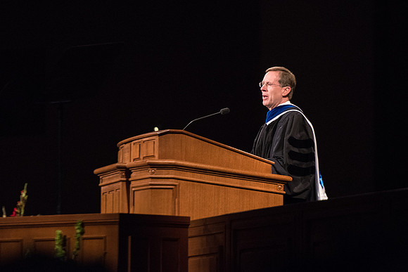 Brother Mark B. Woodruff speaks during Commencement.
