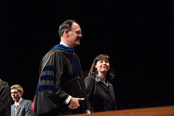 Bishop W. Christopher Waddell exits Commencement.