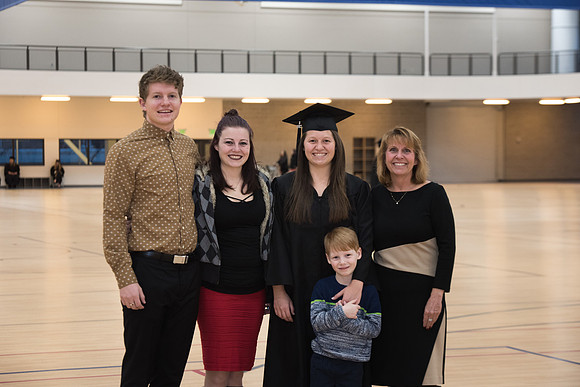 Graduates meet in the I-Center Courts for Processional.