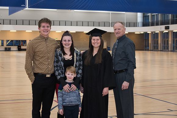Graduates meet in the I-Center Courts for Processional.