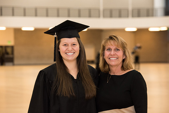 Graduates meet in the I-Center Courts for Processional.