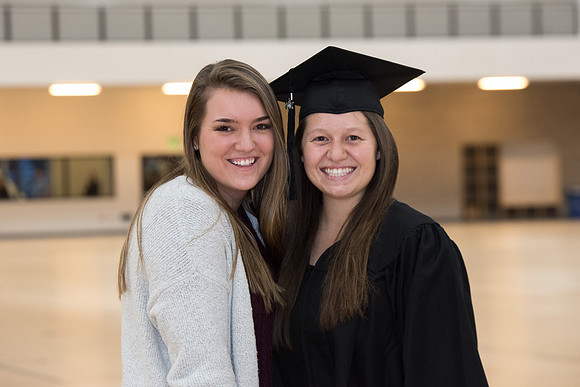 Graduates meet in the I-Center Courts for Processional.