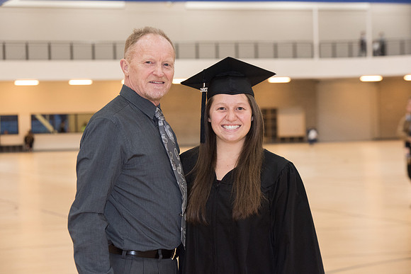 Graduates meet in the I-Center Courts for Processional.