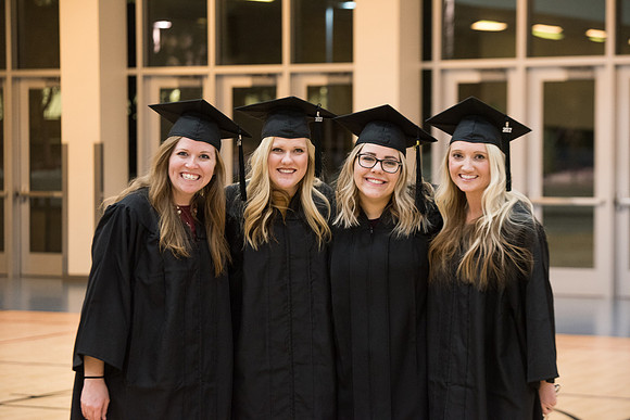 Graduates meet in the I-Center Courts for Processional.