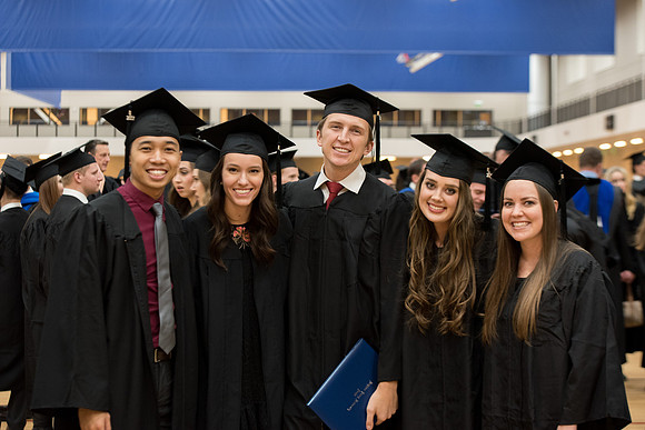 Graduates meet in the I-Center Courts for Processional.