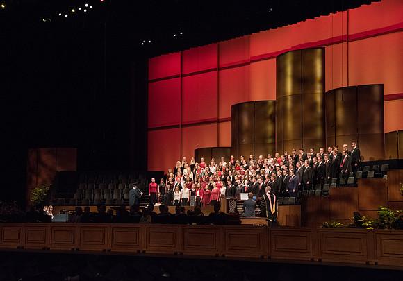 The Combined Women's and Men's Choir sings, "Hark! The Herald Angels Sing," during Commencement.