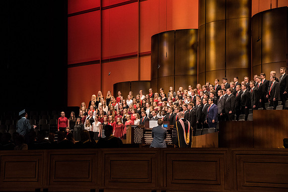 The Combined Women's and Men's Choir sings, "Hark! The Herald Angels Sing," during Commencement.