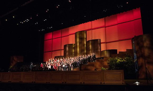 The Combined Women's and Men's Choir sings, "Hark! The Herald Angels Sing," during Commencement.