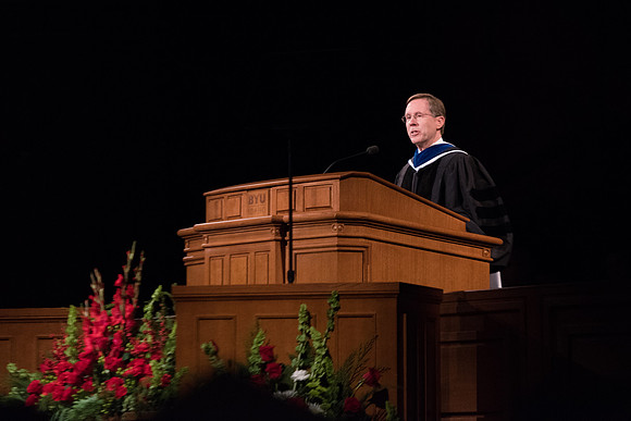 Brother Mark B. Woodruff speaks during Commencement.