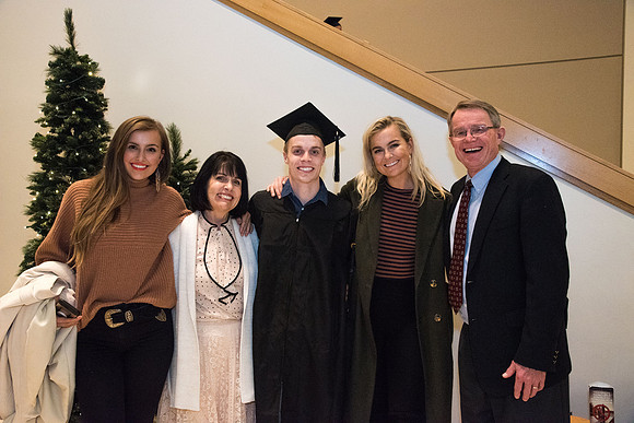 Graduates and families capture the moment after Commencement.