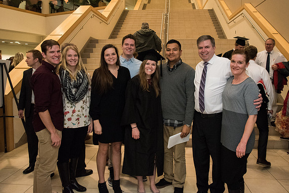 Graduates and families capture the moment after Commencement.