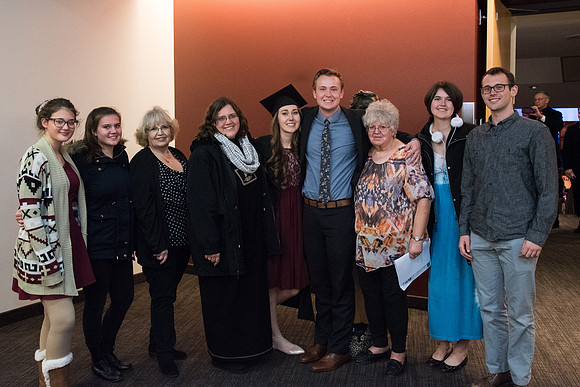 Graduates and families capture the moment after Commencement.