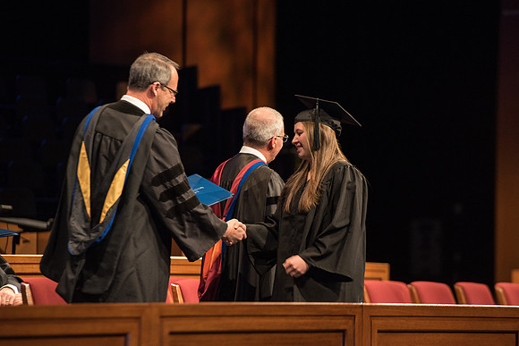 Recreation Management Major, Heather Yule, accepts her diploma and walks for Graduation.