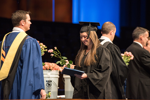 Recreation Management Major, Heather Yule, accepts her diploma and walks for Graduation.