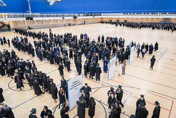 Graduates and their families gather in the I-Center for the Fall 2017 Commencement.