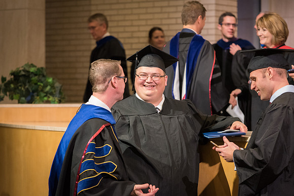 Home and Family Studies graduates gather in the Taylor Chapel for their convocation.