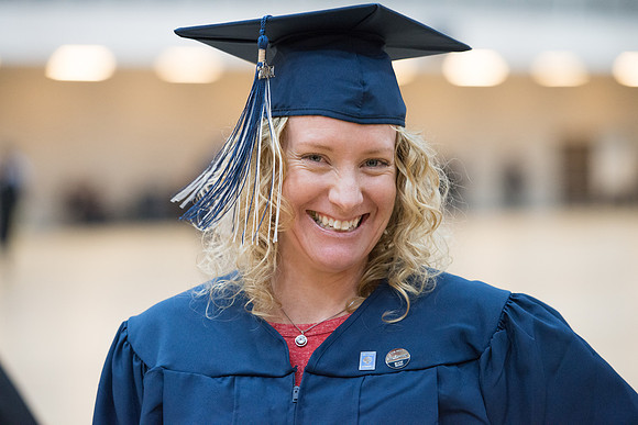 Pathway graduates gather in the BYU-Idaho Center for graduation. Dec 2017