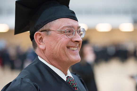 Pathway graduates gather in the BYU-Idaho Center for graduation. Dec 2017