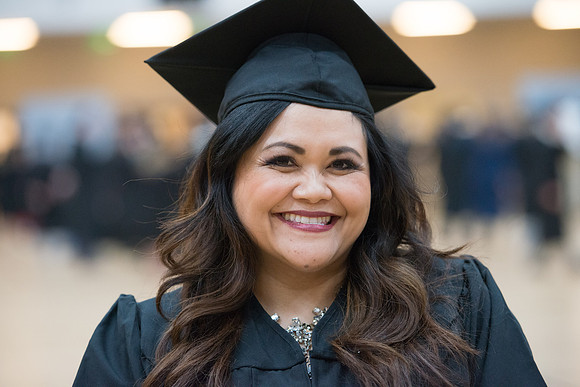 Pathway graduates gather in the BYU-Idaho Center for graduation. Dec 2017