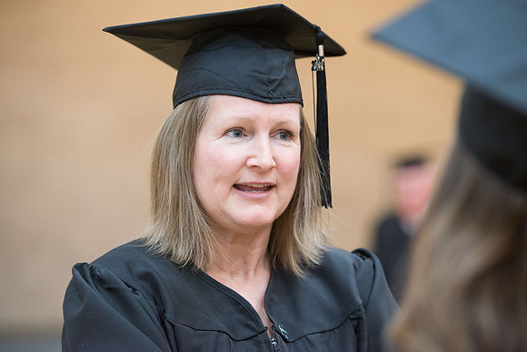 Pathway graduates gather in the BYU-Idaho Center for graduation. Dec 2017