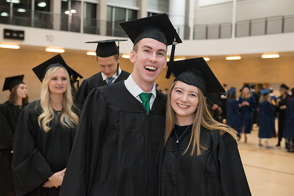 Graduates gather in the BYU-Idaho Center for graduation. Dec 2017