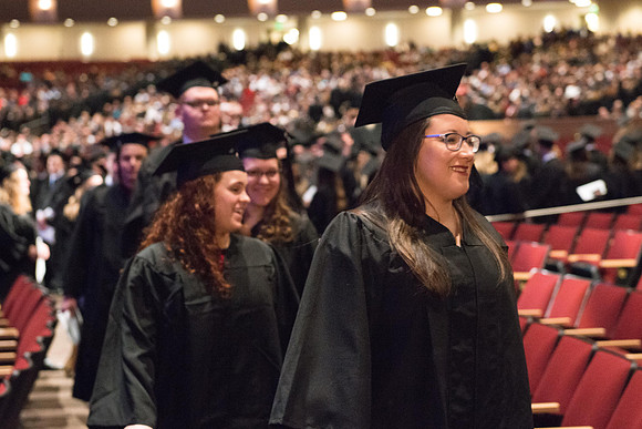 Commencement - Recessional, graduates file out of the BYU-Idaho Center.  Dec 2017