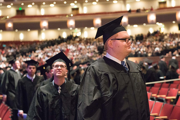 Commencement - Recessional, graduates file out of the BYU-Idaho Center.  Dec 2017