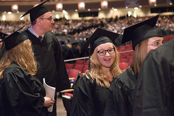Commencement - Recessional, graduates file out of the BYU-Idaho Center.  Dec 2017