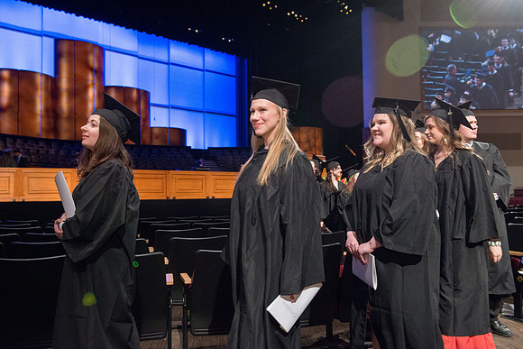 Commencement - Recessional, graduates file out of the BYU-Idaho Center.  Dec 2017