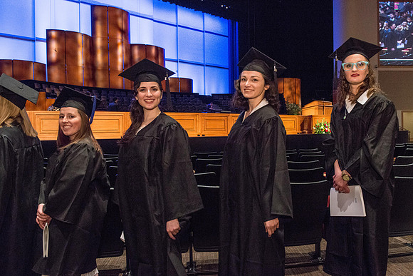 Commencement - Recessional, graduates file out of the BYU-Idaho Center.  Dec 2017