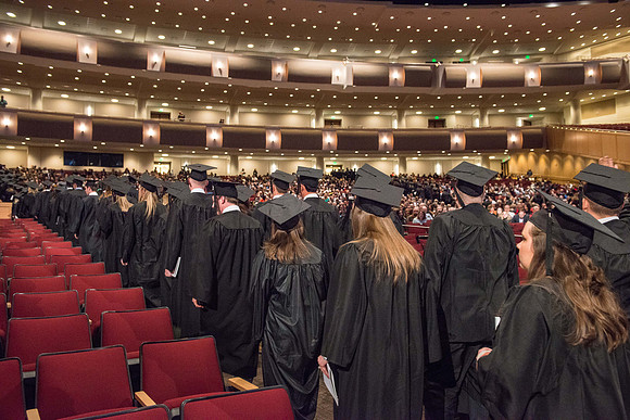 Commencement - Recessional, graduates file out of the BYU-Idaho Center.  Dec 2017